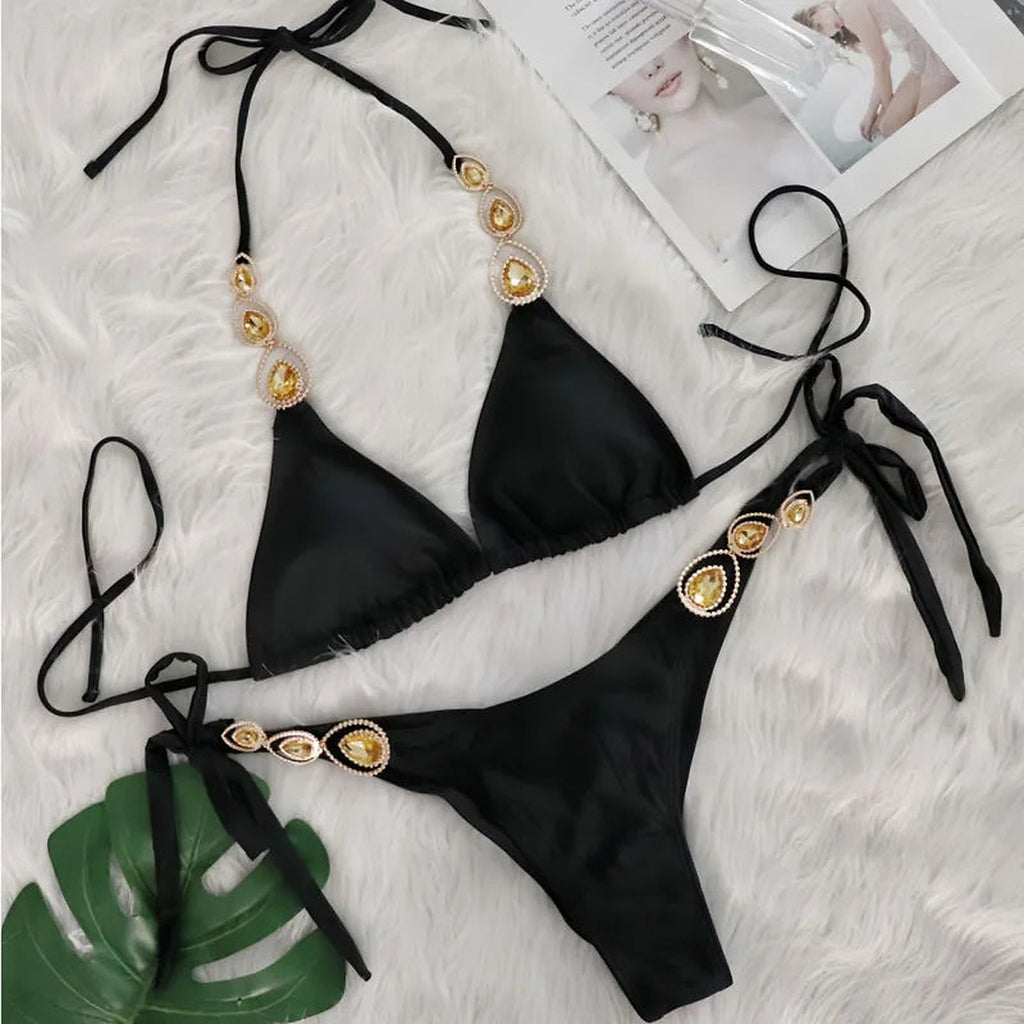 SORAVEA Luna strassdekorerad guldbikini svart flatlay