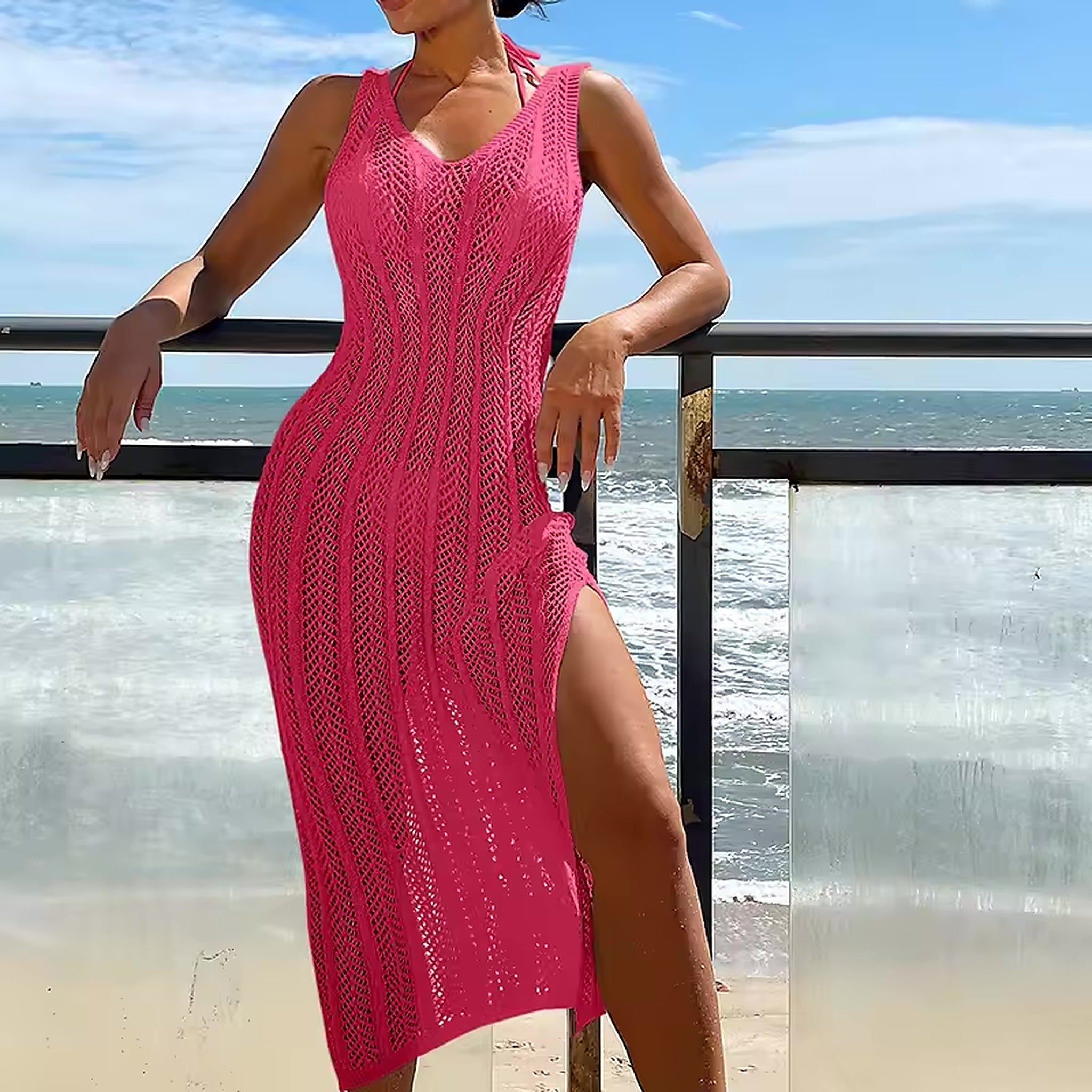 Pink knit open-weave sleeveless cover-up dress at the beach