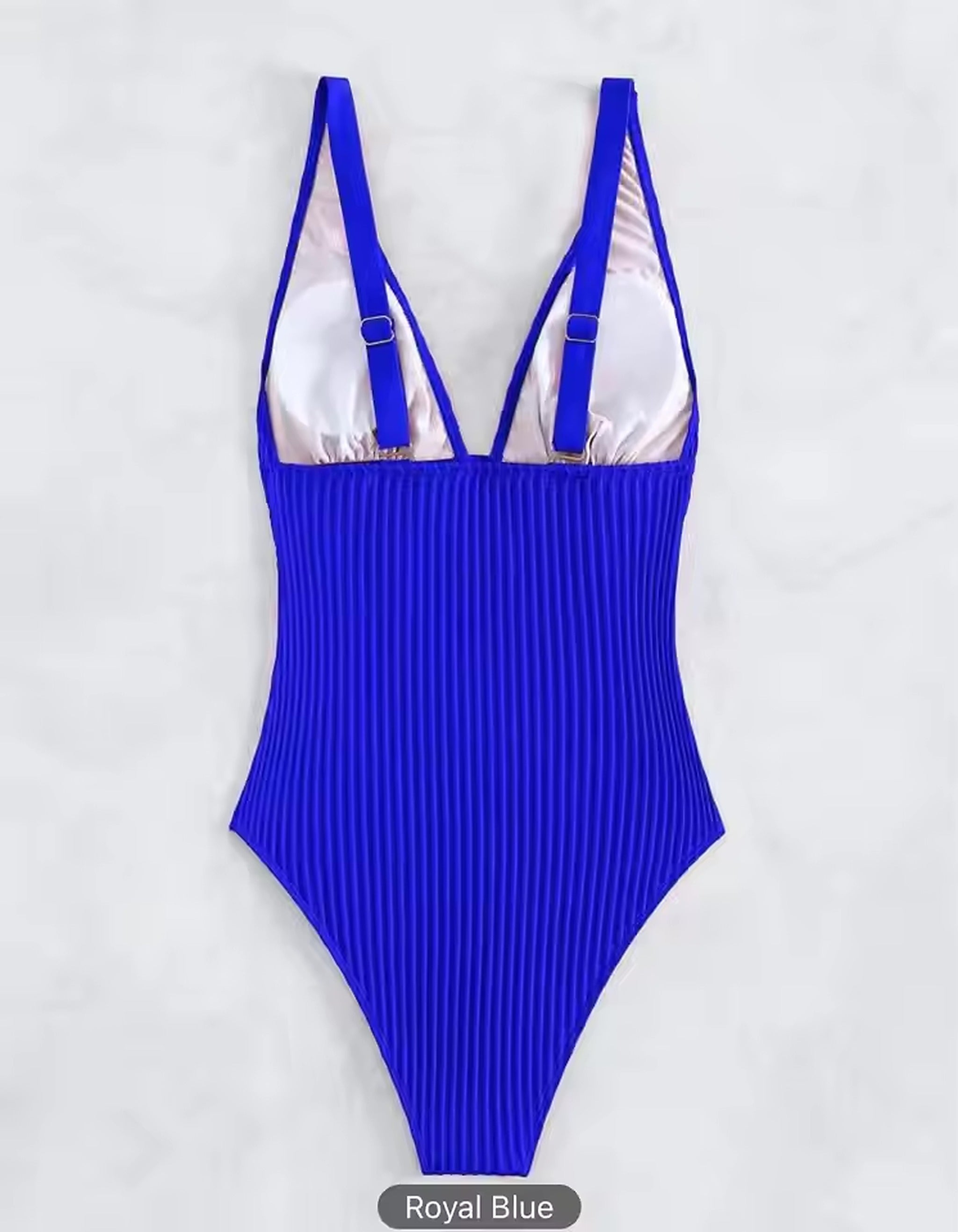 Royal blue ribbed bikini with adjustable straps and white cup lining, displayed flat on white background