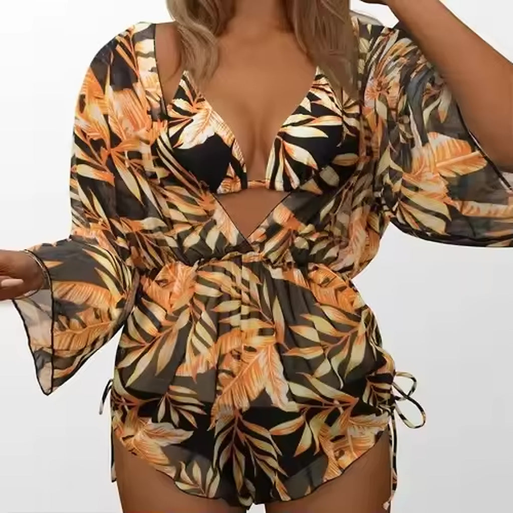 Black and gold tropical leaf print bikini top with matching sheer wrap shirt and adjustable side ties